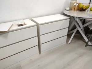 Handyman-assembled white dressers in a Toronto home interior